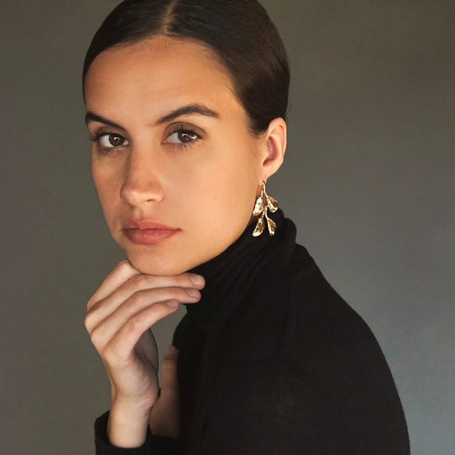 Model wearing Yellow Bronze Callistemon Ear Cuff by Kirsten Muenster 